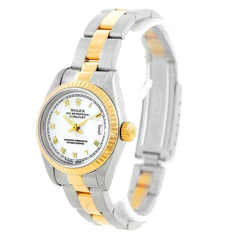 This image shows a Rolex Datejust 69173 Women's Stainless Steel White Dial 69173 Women's Stainless Steel White Dial watch at an angle, highlighting its gold and silver bracelet, white dial, and fluted bezel.
