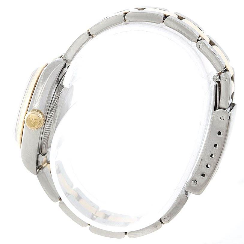 The image shows a side profile of the Rolex Datejust 69173 Women's Stainless Steel White Dial 69173 Women's Stainless Steel White Dial watch, highlighting its case, crown, and bracelet.