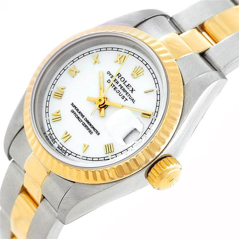 The image shows a close-up angle of the Rolex Datejust 69173 Women's Stainless Steel White Dial 69173 Women's Stainless Steel White Dial model, highlighting the dial, bezel, crown, and part of the bracelet.
