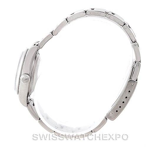 The image shows a side view of a Rolex Datejust 79160 Women's Stainless Steel Silver Dial 79160 Women's Stainless Steel Silver Dial watch, highlighting the case and bracelet.