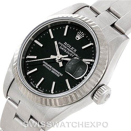 The Rolex Datejust 79174 Women's Stainless Steel Black Dial 79174 Women's Stainless Steel Black Dial watch is shown at an angle displaying its face, bezel, crown, and a portion of the bracelet.