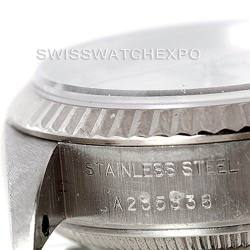This image shows a close-up of the stainless steel case and bezel of a Rolex Datejust 79174 Women's Stainless Steel Silver Dial 79174 Women's Stainless Steel Silver Dial watch.