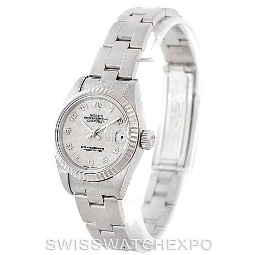 The image shows a Rolex Datejust 79174 Women's Stainless Steel Silver Dial 79174 Women's Stainless Steel Silver Dial watch at an angled view, displaying its dial, fluted bezel, and part of the bracelet.