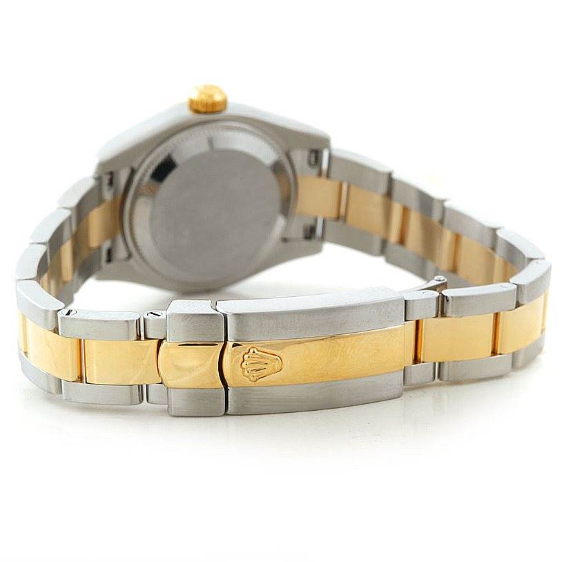This image shows the back and bracelet clasp of a Rolex Datejust 179173 Women's Steel and Gold (two tone) Champagne Dial 179173 Women's Steel and Gold (two tone) Champagne Dial watch, highlighting the two-tone metal and iconic crown logo.