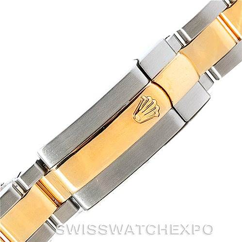 This image shows a close-up of the bracelet clasp of a Rolex Datejust 179173 Women's Steel and Gold (two tone) Silver Dial 179173 Women's Steel and Gold (two tone) Silver Dial watch, featuring stainless steel and gold links.