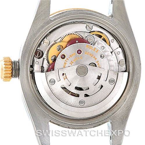 The image shows the movement and inner workings of a Rolex Datejust 179173 Women's Steel and Gold (two tone) Silver Dial 179173 Women's Steel and Gold (two tone) Silver Dial watch viewed from the back, with the case removed.