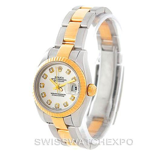 This image shows a Rolex Datejust 179173 Women's Steel and Gold (two tone) Silver Dial 179173 Women's Steel and Gold (two tone) Silver Dial watch at an oblique angle, highlighting the face, bezel, bracelet, and crown.