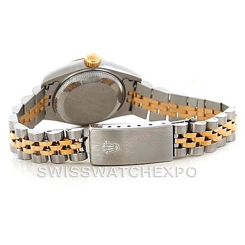 The image shows the backside and clasp of a Rolex Datejust 79173 Women
s Stainless Steel White Dial 79173 Women
s Stainless Steel White Dial watch, highlighting its two-tone metal bracelet.