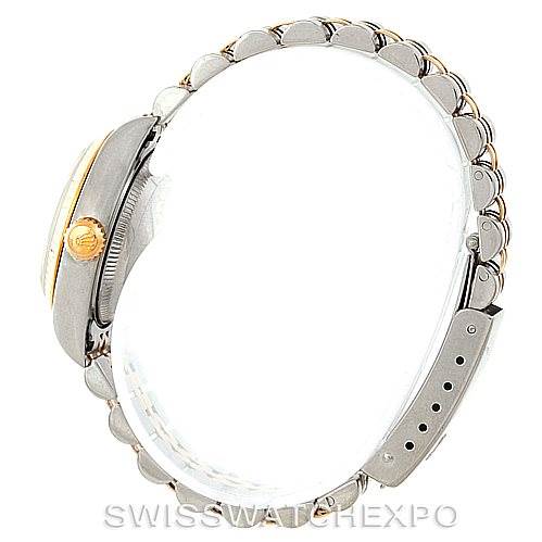 This side view of a Rolex Datejust 79173 Women's Stainless Steel Silver Dial 79173 Women's Stainless Steel Silver Dial watch showcases the case, crown, and bracelet.