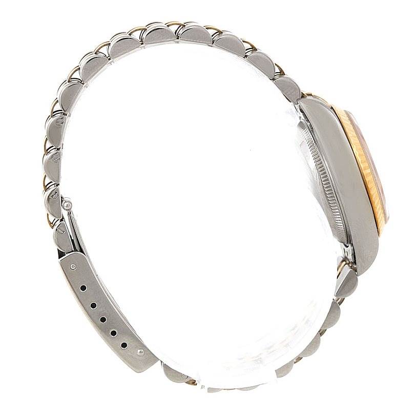 This image shows a side view of the Rolex Datejust 69173 Women
s Stainless Steel Blue Dial 69173 Women
s Stainless Steel Blue Dial watch, highlighting the bracelet and the edge of the watch case and bezel.