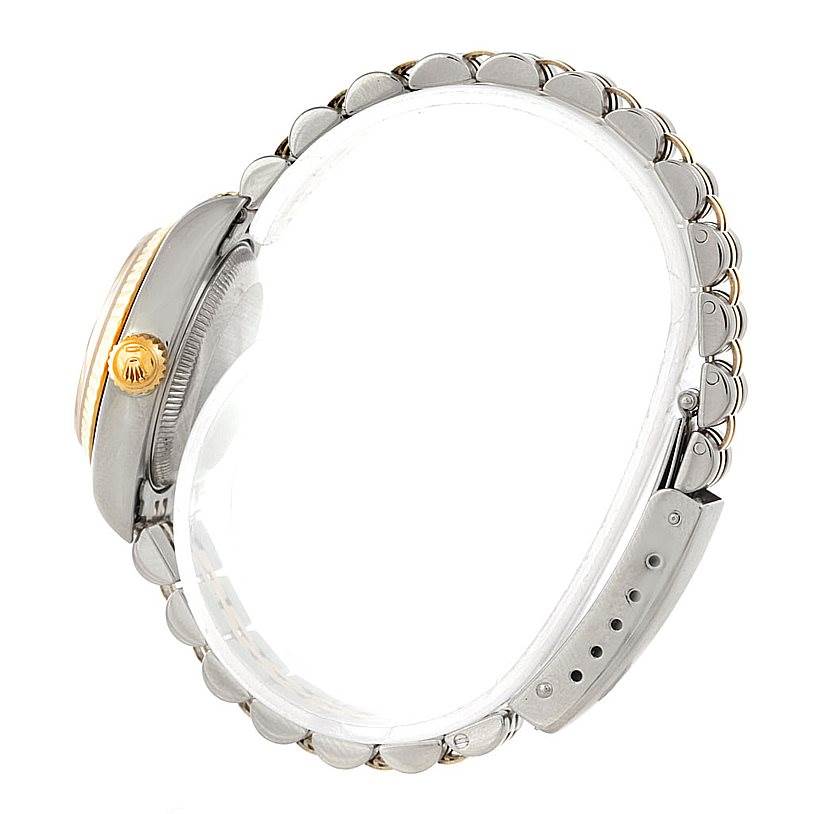 The image shows a side view of a Rolex Datejust 69173 Women
s Stainless Steel Blue Dial 69173 Women
s Stainless Steel Blue Dial watch, highlighting the crown, case, and part of the bracelet.