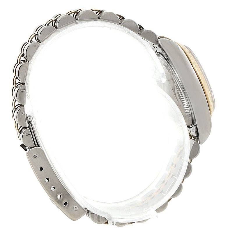 The image shows a side angle of a Rolex Datejust 79173 Women's Stainless Steel Mother of Pearl Dial 79173 Women's Stainless Steel Mother of Pearl Dial watch, highlighting the band and the case.