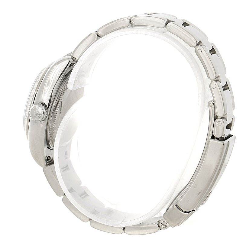 The image shows the side view of a Rolex Datejust 179174 Women's Stainless Steel Mother of Pearl Dial 179174 Women's Stainless Steel Mother of Pearl Dial watch, highlighting its case, crown, and bracelet.