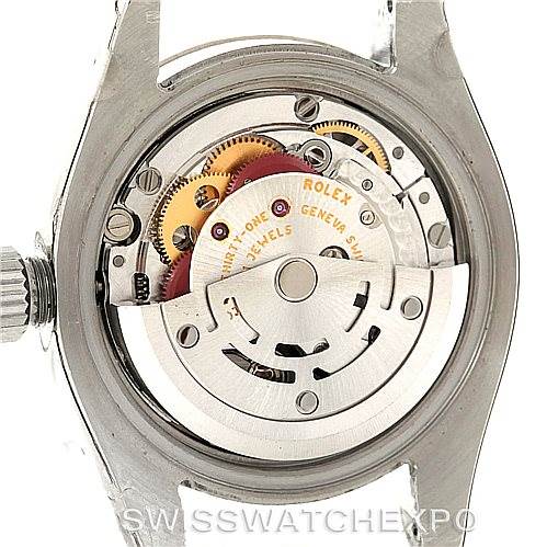 The image displays the back side, showing the intricate movement mechanism of a Rolex Datejust 179174 Women's Stainless Steel Pink Dial 179174 Women's Stainless Steel Pink Dial watch.