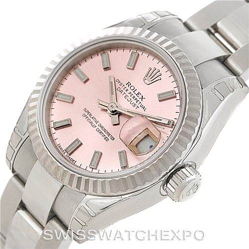This image shows a close-up angled view of the Rolex Datejust 179174 Women's Stainless Steel Pink Dial 179174 Women's Stainless Steel Pink Dial watch, highlighting its pink dial, bezel, and bracelet.