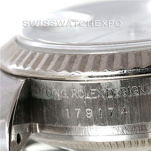 The image shows a close-up of the case side of a Rolex Datejust 179174 Women's Stainless Steel Mother of Pearl Dial 179174 Women's Stainless Steel Mother of Pearl Dial model, highlighting the engraved text and model number.