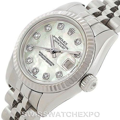 This image shows a Rolex Datejust 179174 Women's Stainless Steel Mother of Pearl Dial 179174 Women's Stainless Steel Mother of Pearl Dial watch from an angled top-down perspective, highlighting the dial, bezel, crown, and bracelet.