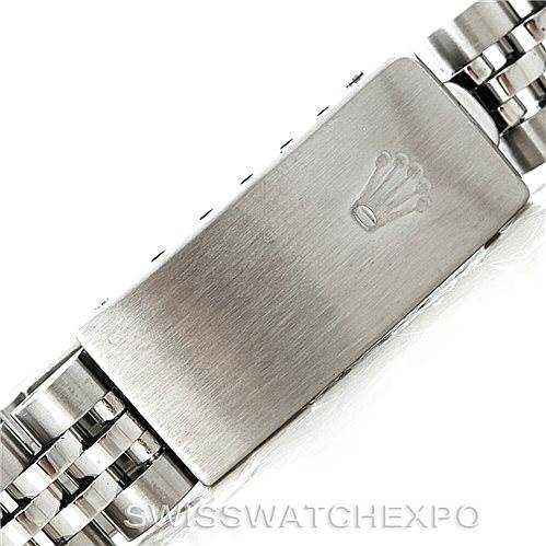 This image shows a close-up of the clasp on a Rolex Datejust 79174 Women's Stainless Steel Silver Dial 79174 Women's Stainless Steel Silver Dial watch bracelet, featuring the Rolex crown logo.