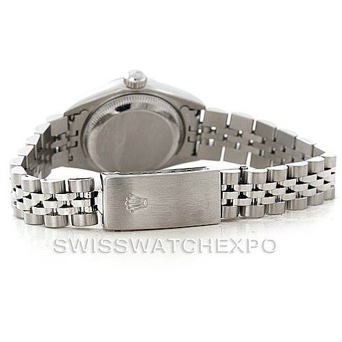 The image shows the back view of a Rolex Datejust 79174 Women's Stainless Steel Silver Dial 79174 Women's Stainless Steel Silver Dial watch, displaying the case back and the intricate metal bracelet with a clasp.