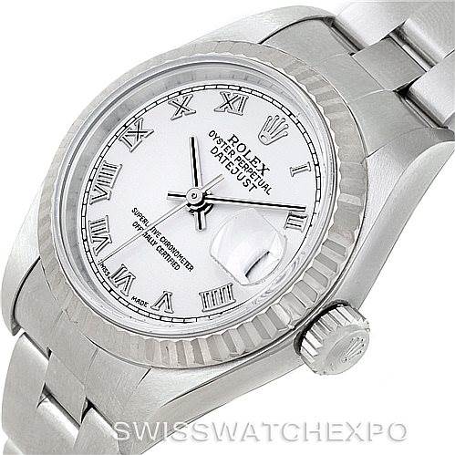 This image shows a close-up angle of a Rolex Datejust 79174 Women's Stainless Steel White Dial 79174 Women's Stainless Steel White Dial watch, highlighting its face, bezel, and partially its bracelet.