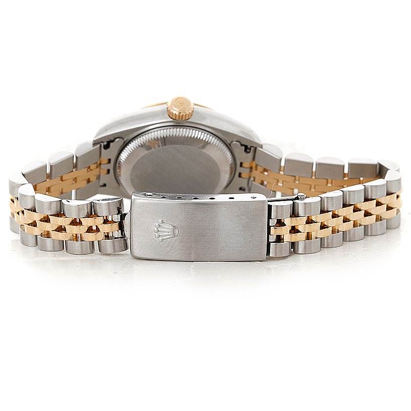 This image shows the back view of a Rolex Datejust 79173 Women's Stainless Steel Blue Dial 79173 Women's Stainless Steel Blue Dial watch, focusing on the case, crown, and two-tone bracelet clasp.