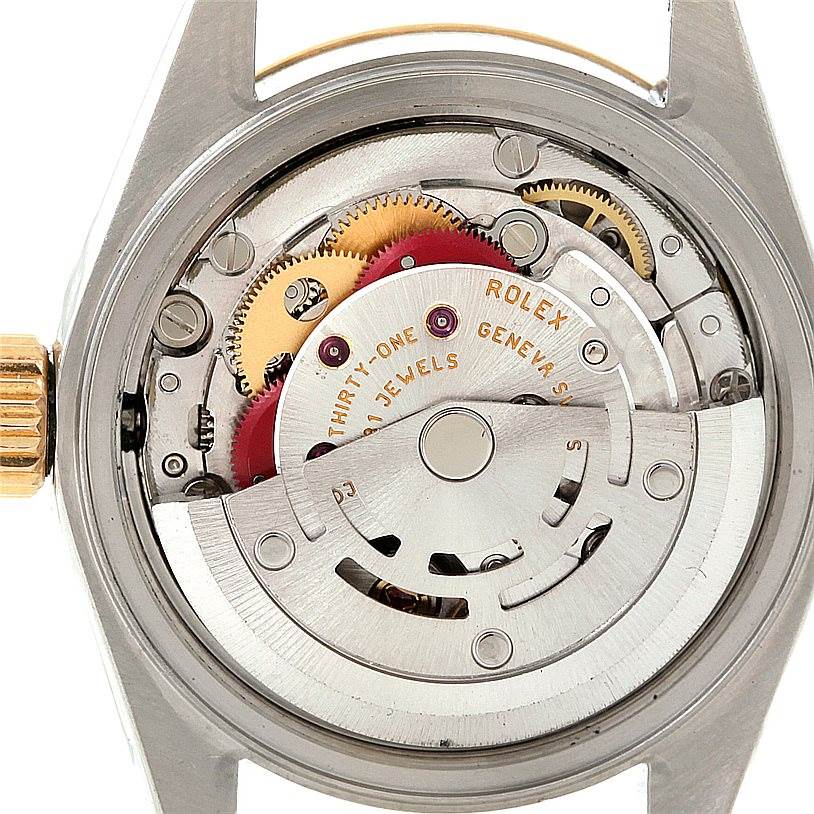 This image shows the inner mechanical movement of a Rolex Datejust 79173 Women's Stainless Steel Blue Dial 79173 Women's Stainless Steel Blue Dial watch from the back view.