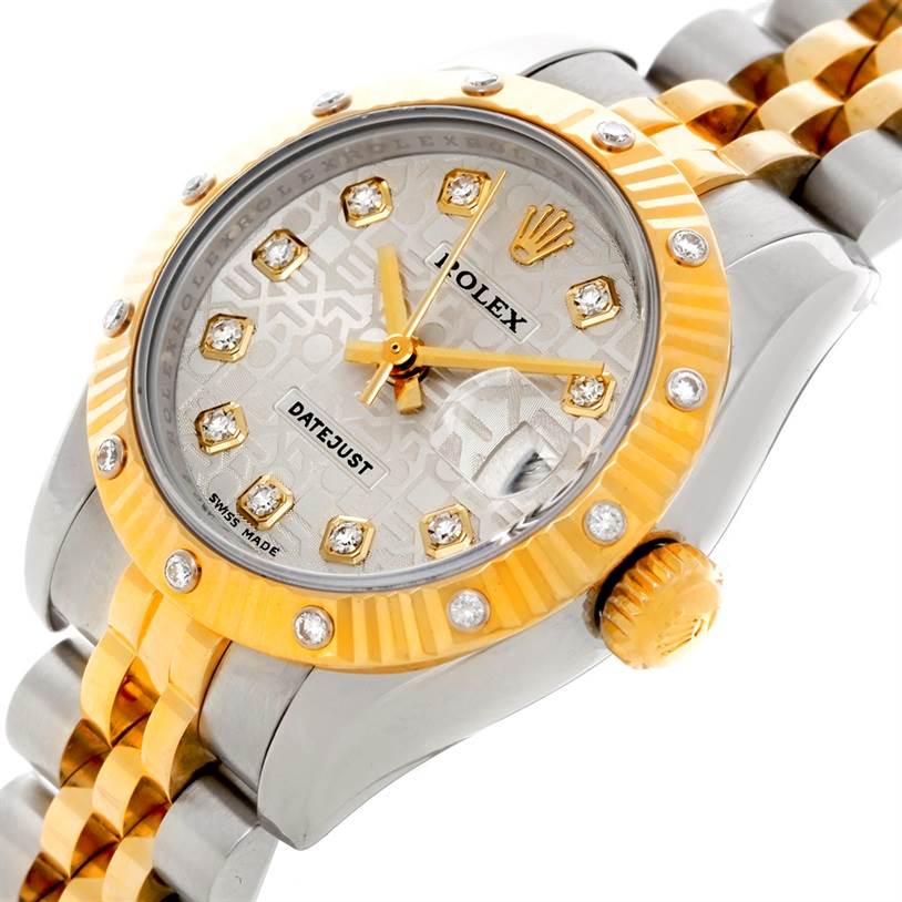 The image shows a close-up of the dial and bezel of a Rolex Datejust 179313 Women
s Stainless Steel Beige Dial 179313 Women
s Stainless Steel Beige Dial watch, highlighting the gold accents and diamond markers.