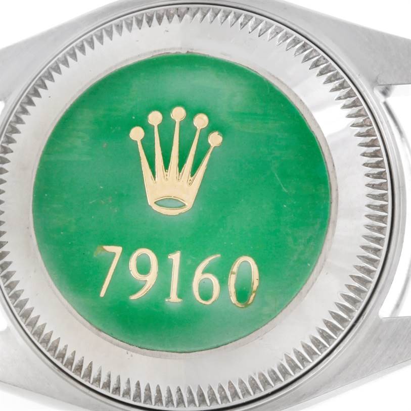 This image shows the back case of a Rolex Datejust 79160 Women's Stainless Steel White Dial 79160 Women's Stainless Steel White Dial watch, displaying the model number 79160 and the Rolex crown logo.