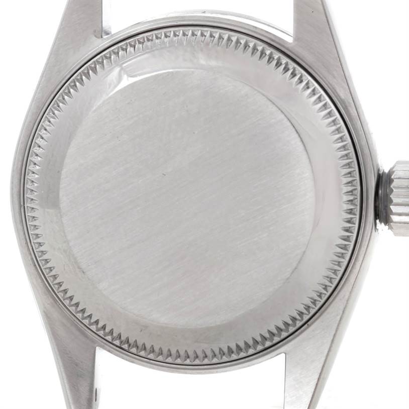 This image shows the case back and crown of a Rolex Datejust 79160 Women's Stainless Steel Silver Dial 79160 Women's Stainless Steel Silver Dial watch viewed from the back.