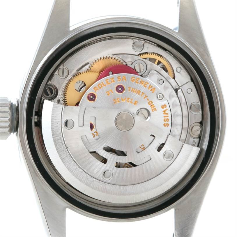 This image shows the internal mechanism and movement of the Rolex Datejust 79160 Women's Stainless Steel Silver Dial 79160 Women's Stainless Steel Silver Dial watch from a rear angle.