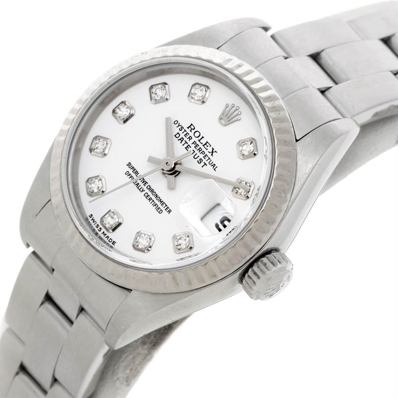 The image displays a Rolex Datejust 79174 Women's Stainless Steel White Dial 79174 Women's Stainless Steel White Dial watch at an angled close-up, highlighting the dial, bezel, and part of the bracelet.