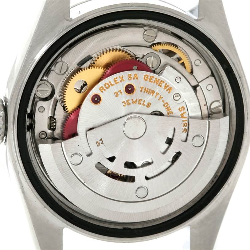 This image shows the back view of the Rolex Datejust 79160 Women's Stainless Steel White Dial 79160 Women's Stainless Steel White Dial watch, revealing its internal movement and mechanism components.