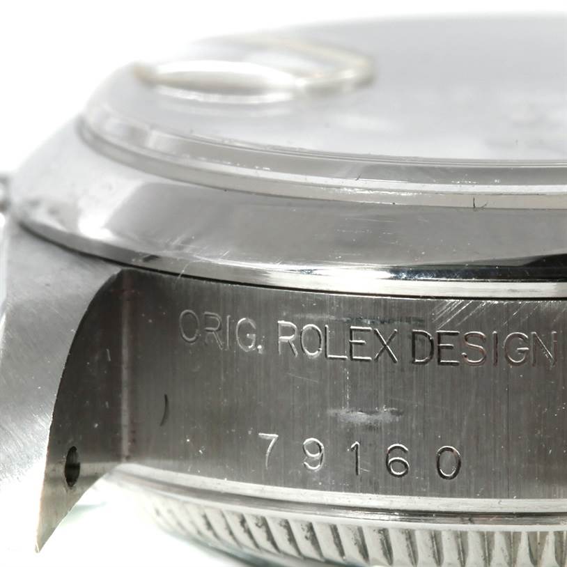 The image shows a close-up of the side of a Rolex Datejust 79160 Women's Stainless Steel White Dial 79160 Women's Stainless Steel White Dial watch, focusing on the engraved model number 79160.