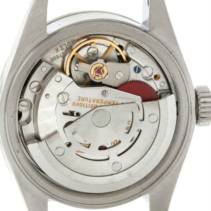 This is a close-up view of the movement and internal mechanics of a Rolex Datejust 69160 Women
s Stainless Steel Blue Dial 69160 Women
s Stainless Steel Blue Dial watch.