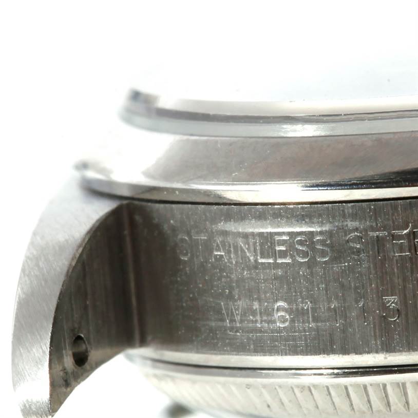 This image shows a close-up of the side of a Rolex Datejust 69160 Women
s Stainless Steel Blue Dial 69160 Women
s Stainless Steel Blue Dial watch case, highlighting its stainless steel material and engraved details.