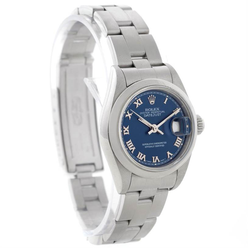 The image shows a Rolex Datejust 69160 Women
s Stainless Steel Blue Dial 69160 Women
s Stainless Steel Blue Dial watch at a three-quarter angle, highlighting its stainless steel bracelet, blue dial, and Roman numerals.