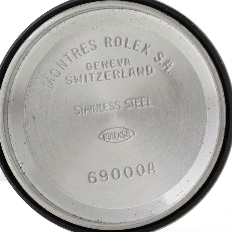 The image shows the interior side of a stainless steel case back for a Datejust model by Rolex.