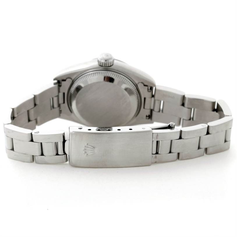 The image shows the back view of the Rolex Datejust 69160 Women
s Stainless Steel Blue Dial 69160 Women
s Stainless Steel Blue Dial watch, focusing on its clasp, bracelet, and case back.