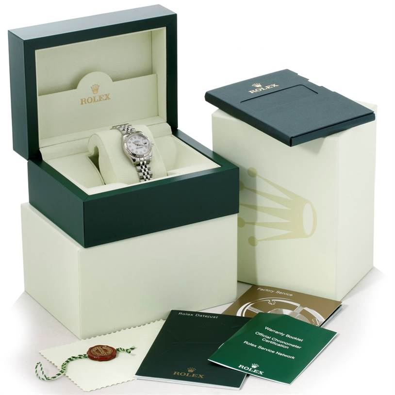 The image shows a Rolex Datejust 179174 Women's Stainless Steel Mother of Pearl Dial 179174 Women's Stainless Steel Mother of Pearl Dial watch in an open green and cream box, surrounded by warranty booklets and certificates.