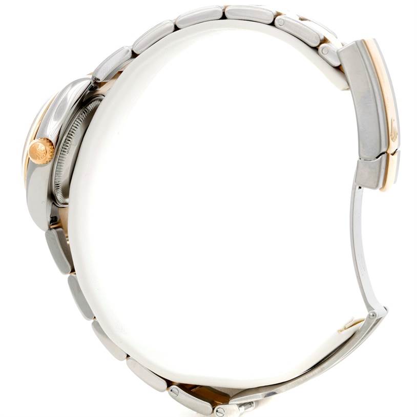 The image shows a side profile of the Rolex Datejust 179163 Women's Steel and Gold (two tone) Silver Dial 179163 Women's Steel and Gold (two tone) Silver Dial watch, highlighting the bezel, crown, and bracelet.