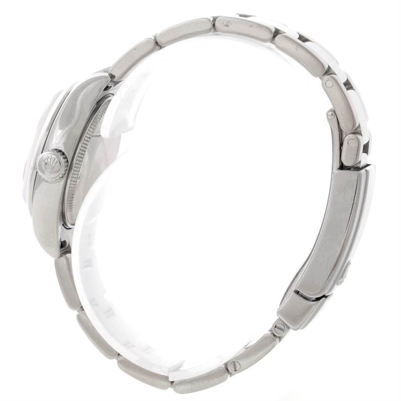 A side profile view of the Rolex Datejust 179160 Women's Stainless Steel White Dial 179160 Women's Stainless Steel White Dial watch, showing the crown, case, and metal bracelet.