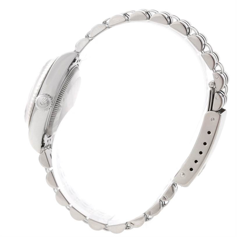 This image shows a side view of the case, crown, and bracelet of a Rolex Datejust 79174 Women's Stainless Steel Mother of Pearl Dial 79174 Women's Stainless Steel Mother of Pearl Dial watch.