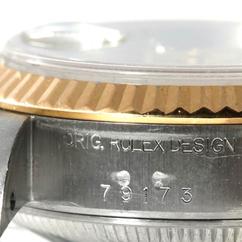 The image shows a side view angle of the case and bezel of a Rolex Datejust 79173 Women's Stainless Steel Silver Dial 79173 Women's Stainless Steel Silver Dial watch, featuring the model number 79173.