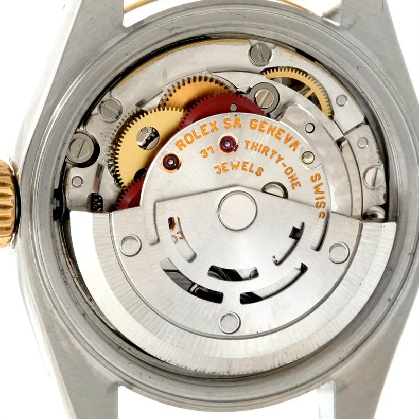 The image shows the internal mechanism and movement components of a Rolex Datejust 79173 Women's Stainless Steel Silver Dial 79173 Women's Stainless Steel Silver Dial watch from a rear angle.