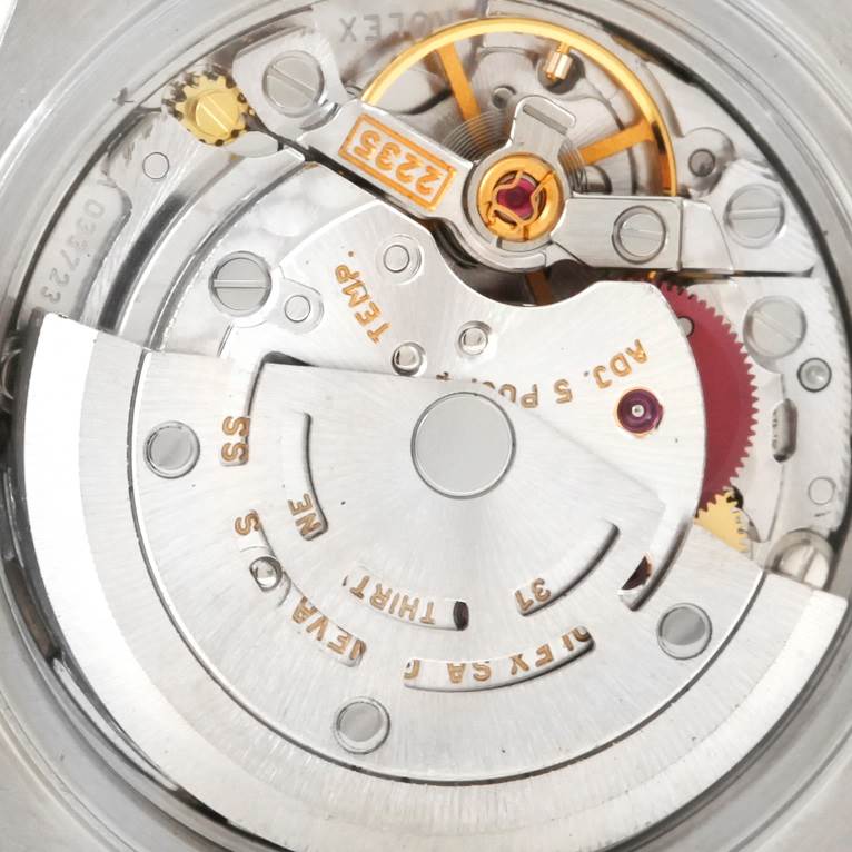 This image shows a close-up view of the inner mechanical movement of a Rolex Datejust 79174 Women
s Stainless Steel White Dial 79174 Women
s Stainless Steel White Dial watch, highlighting its intricate components.