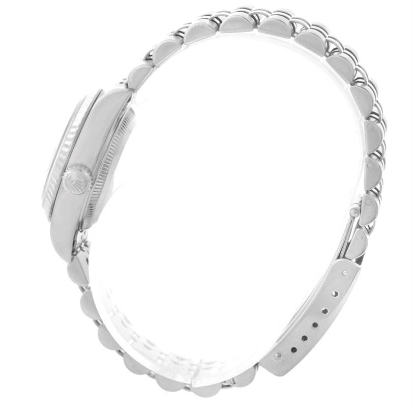 The image shows a side view of a Rolex Datejust 79174 Women
s Stainless Steel White Dial 79174 Women
s Stainless Steel White Dial watch, highlighting the case and bracelet but not the face.