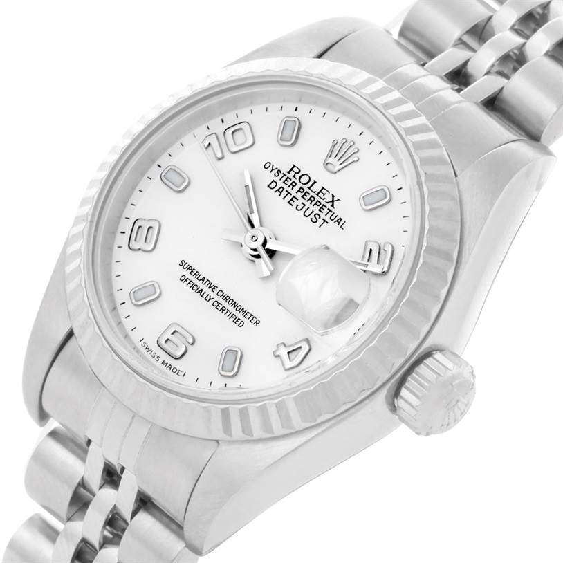 The image shows a close-up angled view of the Rolex Datejust 79174 Women
s Stainless Steel White Dial 79174 Women
s Stainless Steel White Dial watch, highlighting the dial, bezel, crown, and part of the bracelet.