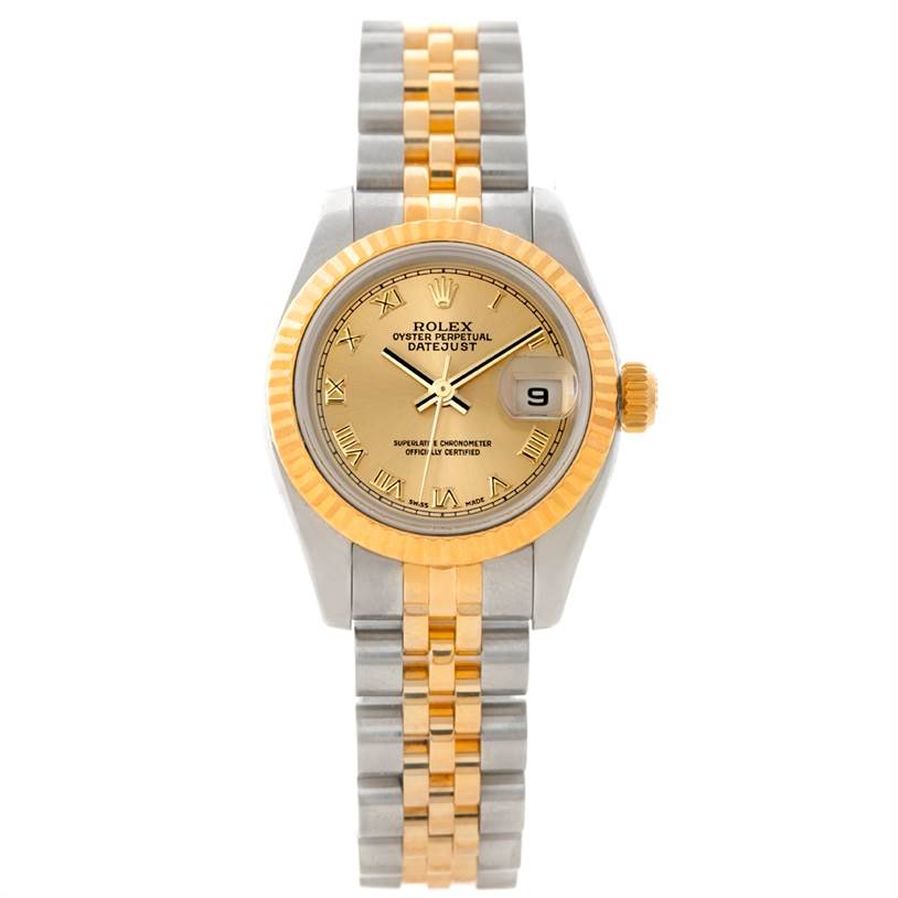 The Rolex Datejust 179173 Women's Steel and Gold (two tone) Champagne Dial 179173 Women's Steel and Gold (two tone) Champagne Dial watch is shown from a top-down angle, highlighting its gold and silver bracelet, gold bezel, and dial.