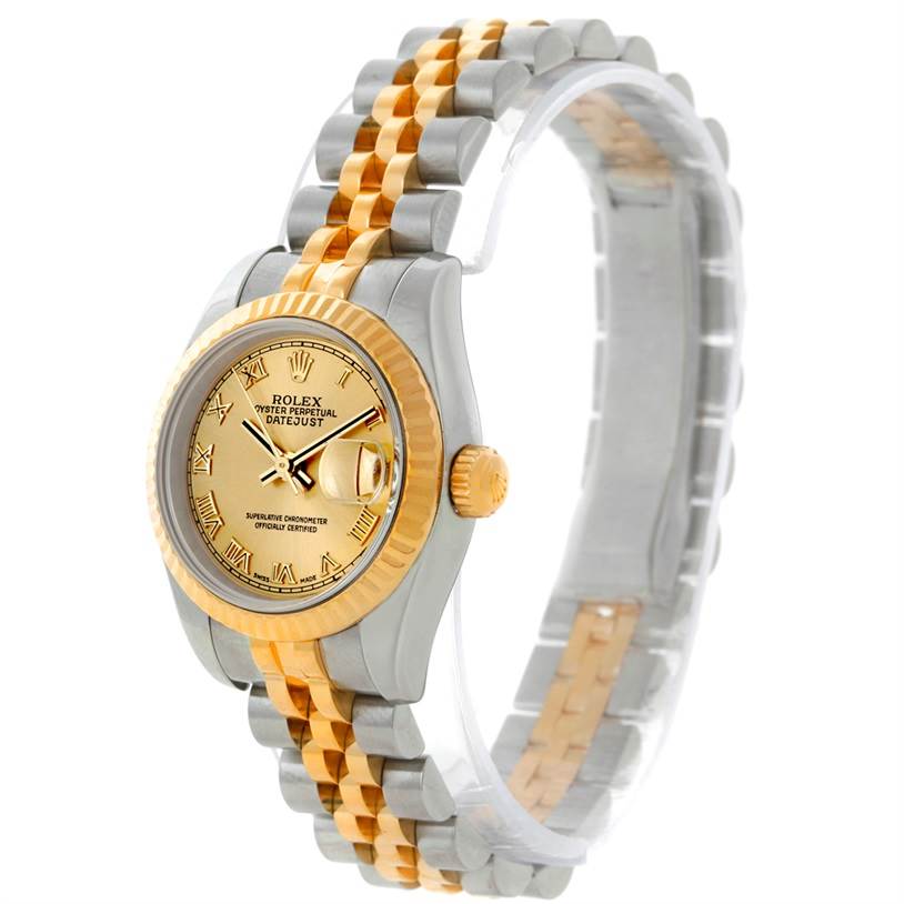 The Rolex Datejust 179173 Women's Steel and Gold (two tone) Champagne Dial 179173 Women's Steel and Gold (two tone) Champagne Dial watch is displayed at a three-quarter angle, revealing the face, bezel, crown, and two-tone bracelet.