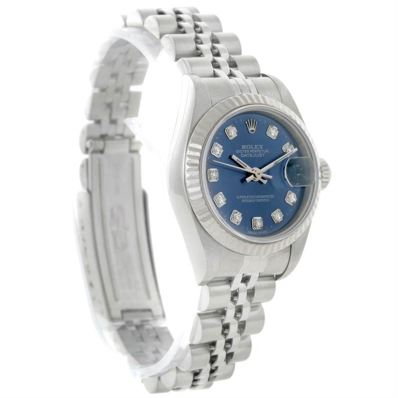 The Rolex Datejust 79174 Women's Stainless Steel Blue Dial 79174 Women's Stainless Steel Blue Dial watch is shown at a slight left-side angle, highlighting its blue dial, fluted bezel, and Jubilee bracelet.